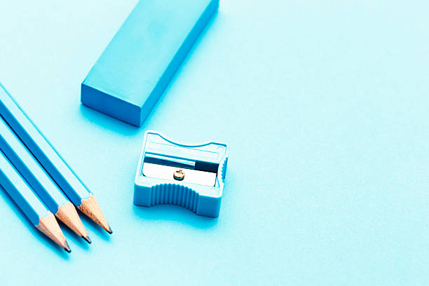 istock Writing making you feel blue? Stationery on turquoise surface 181864289