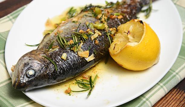 istock Trout baked with herbs and lemon 181864553