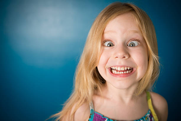 istock Silly, Five Year Old Blond-Haired Girl Making Face 181864590