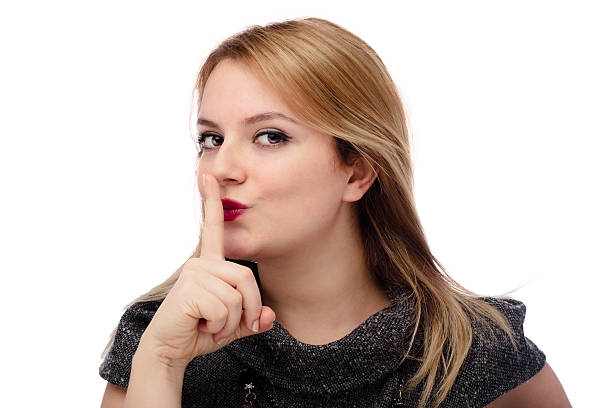 istock Beautiful young woman with warns warning sign 181864880
