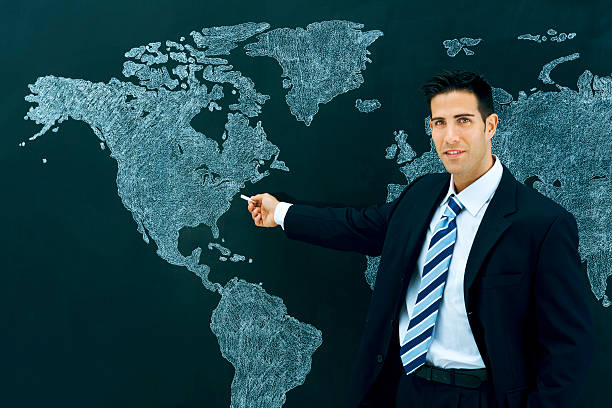 istock Businessman pointing world map: New York 181865022