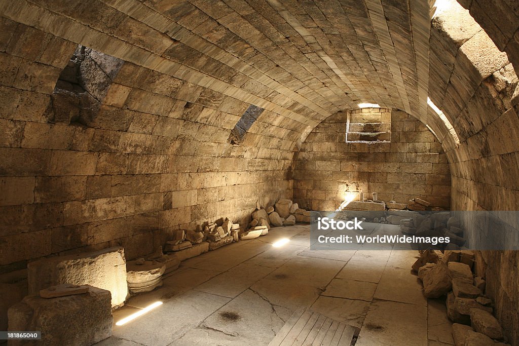 Rare cellar under The Temple of Zeus at Aizanoi "The rare cellar under The Temple of Zeus at Aizanoi,The a SECOND EPHESUSai one of the significant historical places of the world.Besides the best preserved a Zeus Temple of Anatoliaai there is 20,000 capacity amphitheatre  a stadium for  13,500 peple, 2 Turkish baths a columned street, a necropolis and bridges still in daily use, there is also the worlds first stock exchange." Aegean Turkey Stock Photo