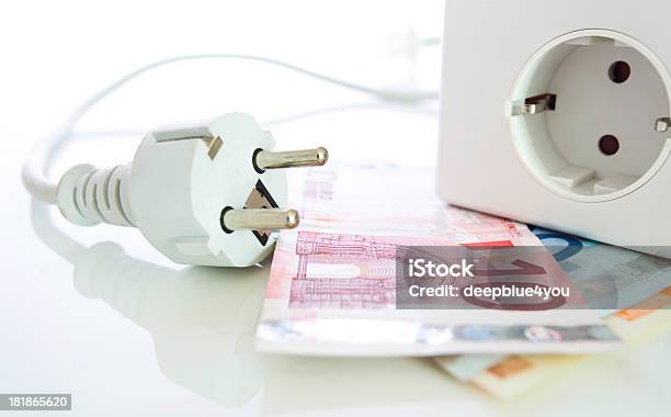 Energy Saving Plug Outlet And European Notes Stock Photo - Download Image Now - Consumerism, Efficiency, Euro Symbol