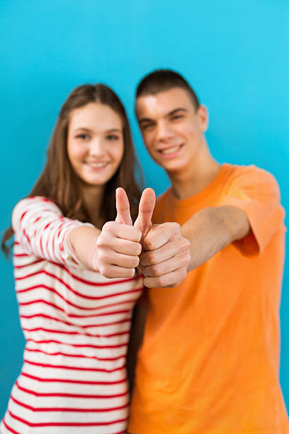 istock Succesfull students showing thumbs up 181865783