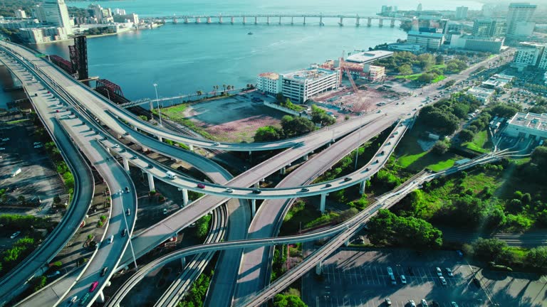 overview of splitting bridge into a different directions for vehicles diversions to move around transport safely following the procedures and signs summer houses Acosta Bridge, Jacksonville, Florida