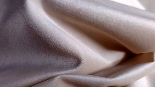 istock Velvet fabric close-up with details, beige. 1818660094