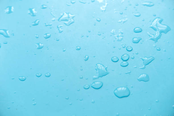 istock Water drops over a blue background for creative poster design. 1818661186