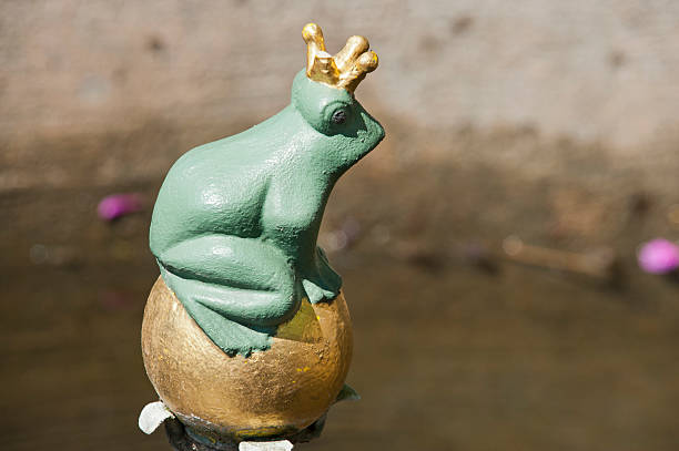 Closeup of a metal frog, part of the game Toad in the hole or frog game (Sapo), a traditional game in South America