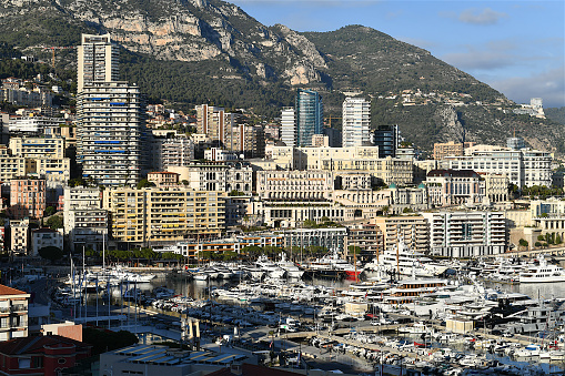 Monte Carlo city aerial panorama timelapse. Port Hercule. View of luxury yachts and buildings in harbor of Monaco, Cote d'Azur.