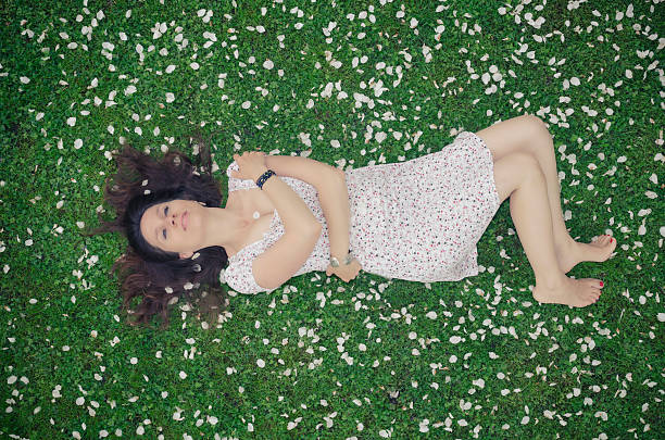 istock Beautiful woman in apple blossoms 181867020