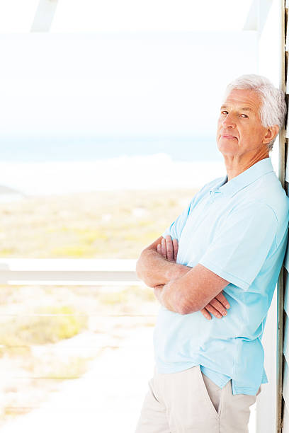 istock Senior Man Leaning On Door 181867308