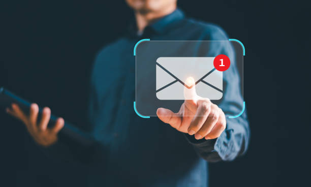 istock New email notification concept, business e-mail communication, digital marketing campaign. Receive notification of electronic messages inbox. Businessman touch email alert screen internet technology 1818675451