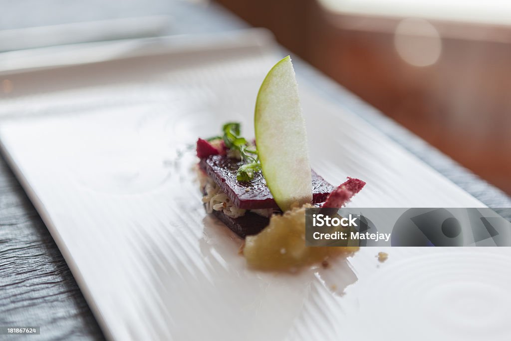 Entree of kingfish ceviche with beetroot jelly and micro herbs "Entree of kingfish ceviche with beetroot jelly, apple and micro herbs" Apple - Fruit Stock Photo