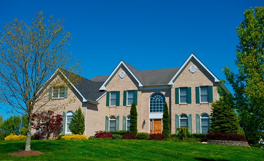 modern home on clear spring day.