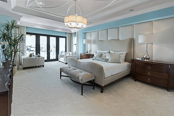beautiful master bedroom interior beautiful bedroom.  rrBuilding and Construction head board bed blue stock pictures, royalty-free photos & images