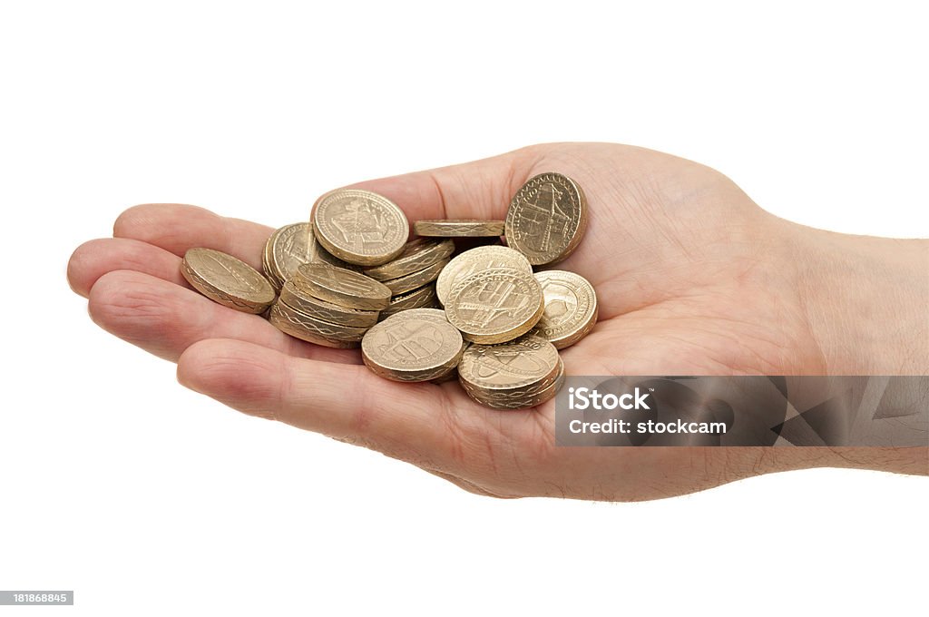 Hand holding Pfund-Münzen - Lizenzfrei Bankgeschäft Stock-Foto