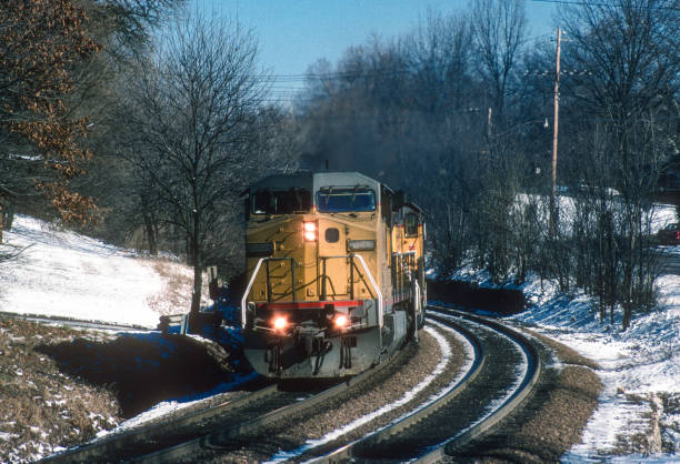 istock Trains in Snow - Westbound After Snow - 1995 1818689328