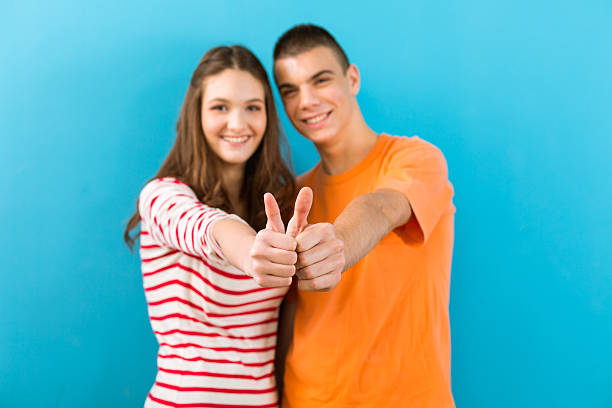 istock Succesfull students showing thumbs up 181868954