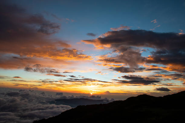 istock emotional sunset above the clouds 1818689898