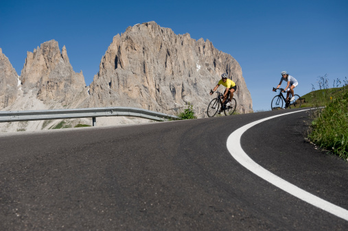 Cycling Racing team at the down hill from the Val Gardena South Tyrol