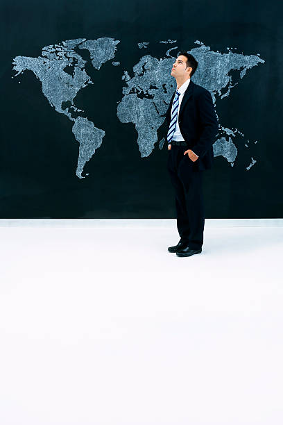 istock Businessman planning international strategy 181869552