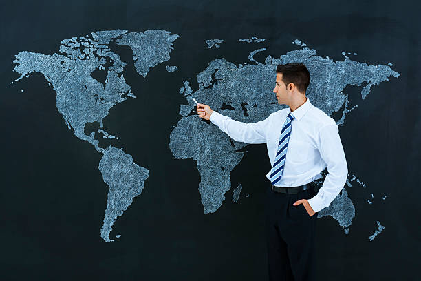 istock Businessman pointing world map: Paris, France 181869726