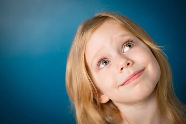 istock Five Year Old Girl Daydreaming/Thinking, With Copy Space 181870706