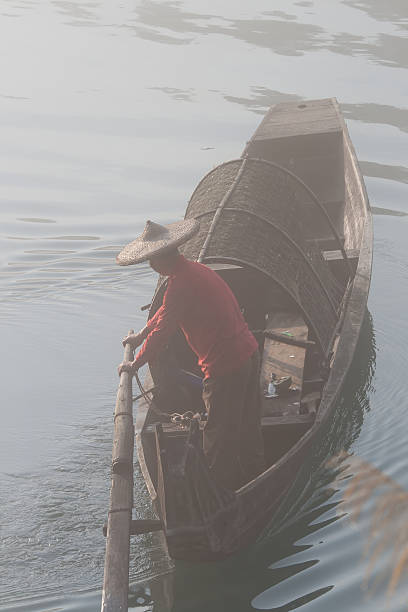 istock fishermen in the fog preparing to fish 181870840