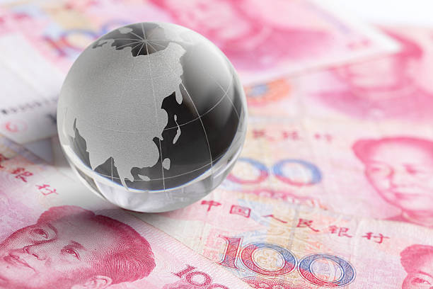 istock glass globe and money 181871367