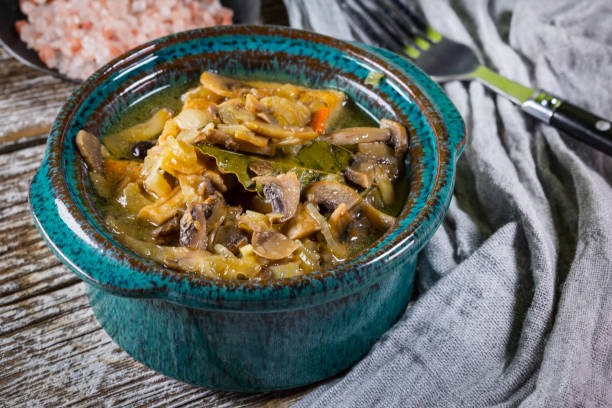 istock Stewed pork loin with mushrooms. 1818714303