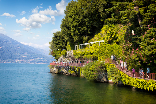 Holidays in Italy - Scenic  view of Lake Como and the tourist path in Varenna