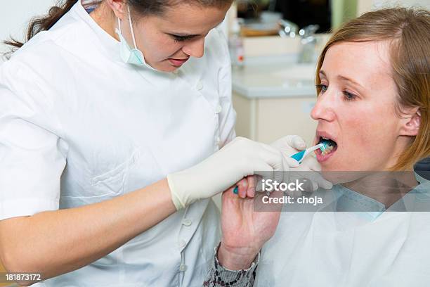 Oral Hygienedental Technician And Woman Patient Stock Photo - Download Image Now - Adult, Dental Assistant, Dental Calculus