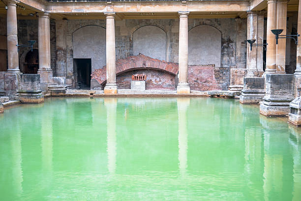 Roman Spa In Bath, England "Roman Baths In Bath, England" roman baths stock pictures, royalty-free photos & images
