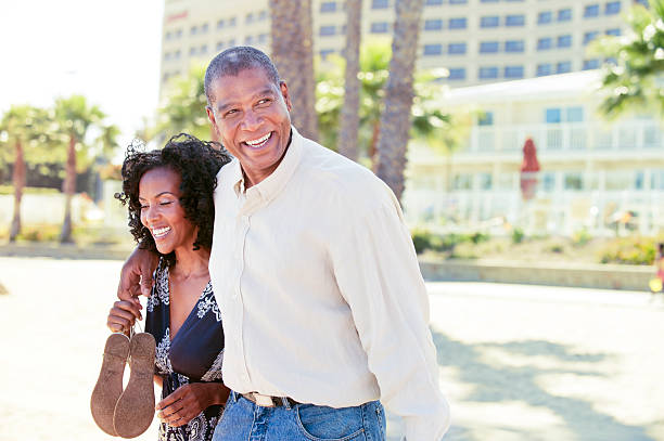istock Couple on the beach 181873304
