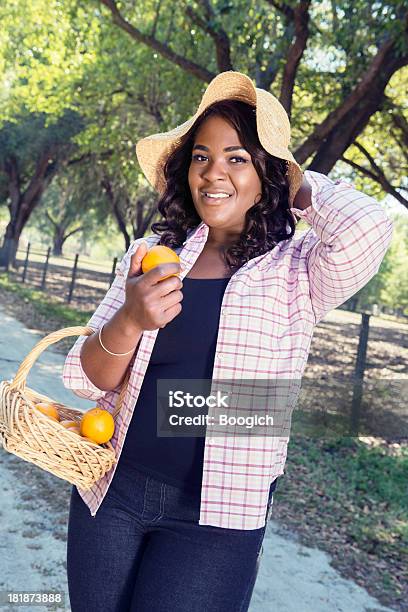 Black Woman With Basket Of Florida Oranges Stock Photo - Download Image Now - Adult, Adults Only, Basket