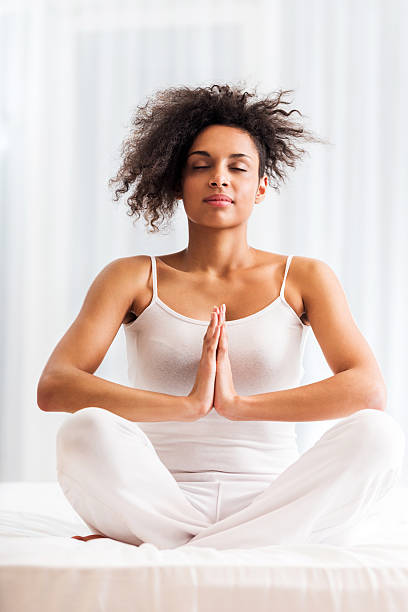 istock African-American woman doing yoga. 181873979