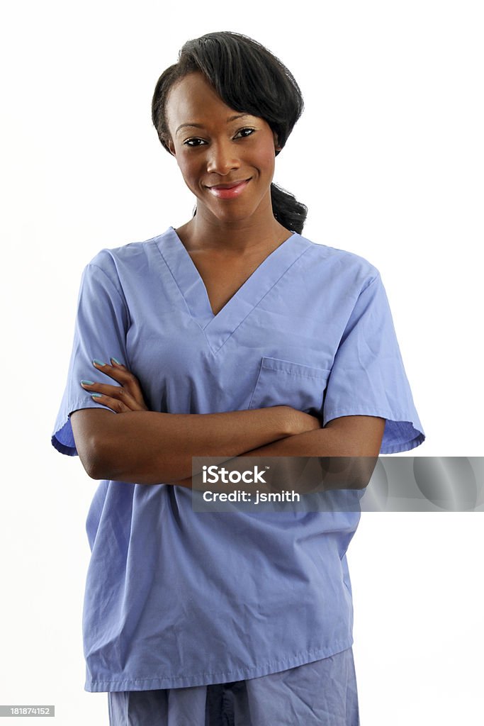 African American pielęgniarki uśmiecha się do siebie - Zbiór zdjęć royalty-free (Kobiety)