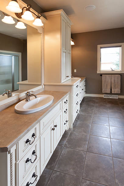 istock Elegant Bathroom With Custom Cabinetry and Tile Floor 181874395