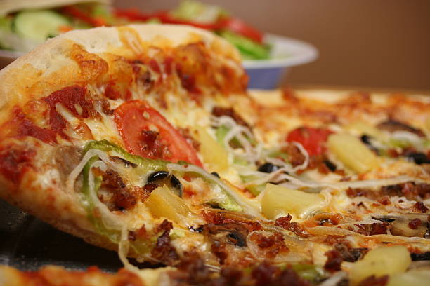istock Slice of Gourmet Pizza 181874465