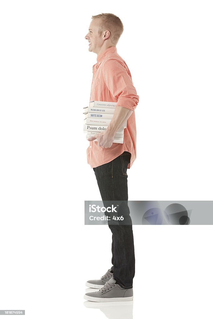 Homme tenant une pile de livres - Photo de Adulte libre de droits