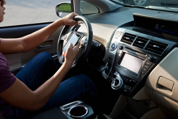 istock Teenager texting in car 181874645