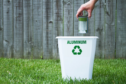a recycling bin for aluminum with copy space. 