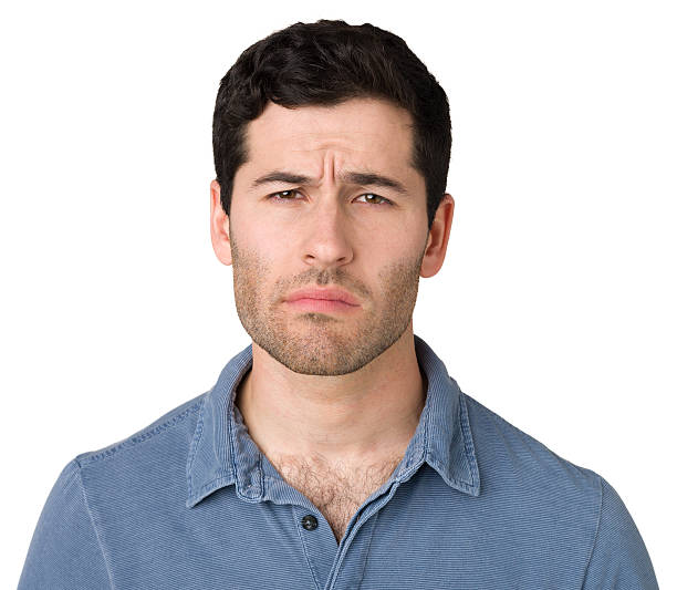 istock Uncertain Frowning Young Man 181875099