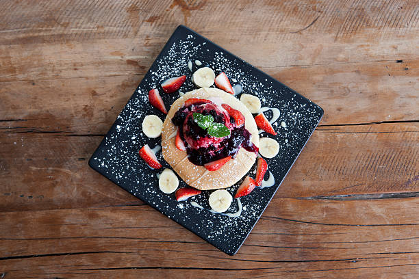 istock Pancakes with ice cream & fruits 181875311