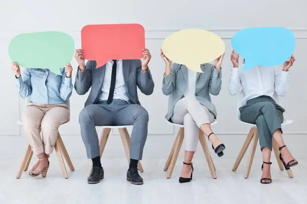 Photo of Business people, chair or speech bubble for recruitment, hiring or about us in a waiting room. Job interview, news or group with banner, mockup or behind advertising space for social media feedback