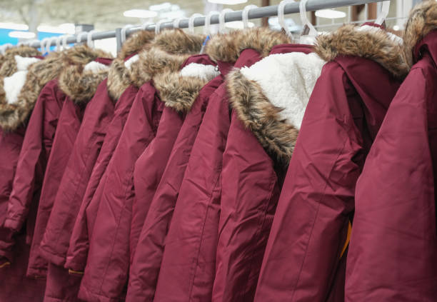 istock row of winter jackets in store 1818758342