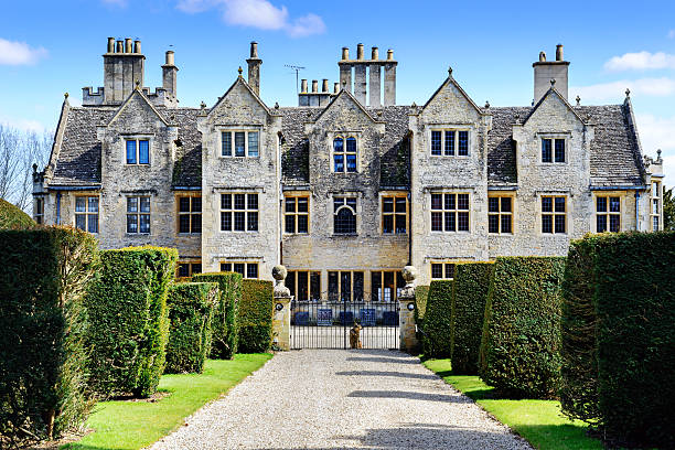 elizabethan manor house no cotswolds, oxfordshire, inglaterra - mansion - fotografias e filmes do acervo