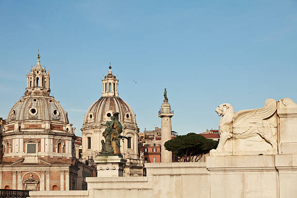 istock Rome - cupolas santa maria di loreto church and lion 181876209