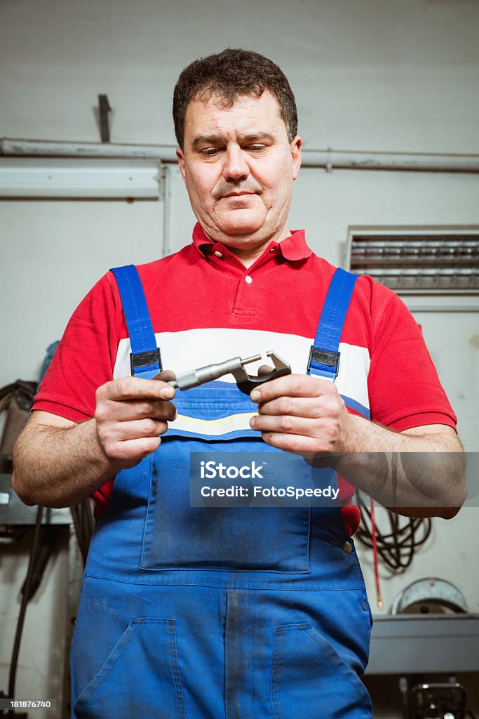 Trabalhador mecânico de máquinas qualificado - Foto de stock de Adulto royalty-free
