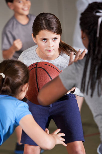 istock Children playing basketball 181876783